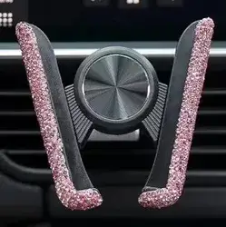 מעמד נייד לרכב אשר נתפס בדרכי האיוורור. אינו מתאים לאיפון 14