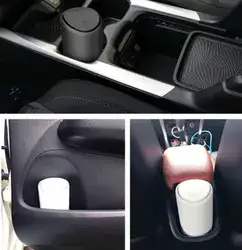 פח אשפה ארוך לבן.